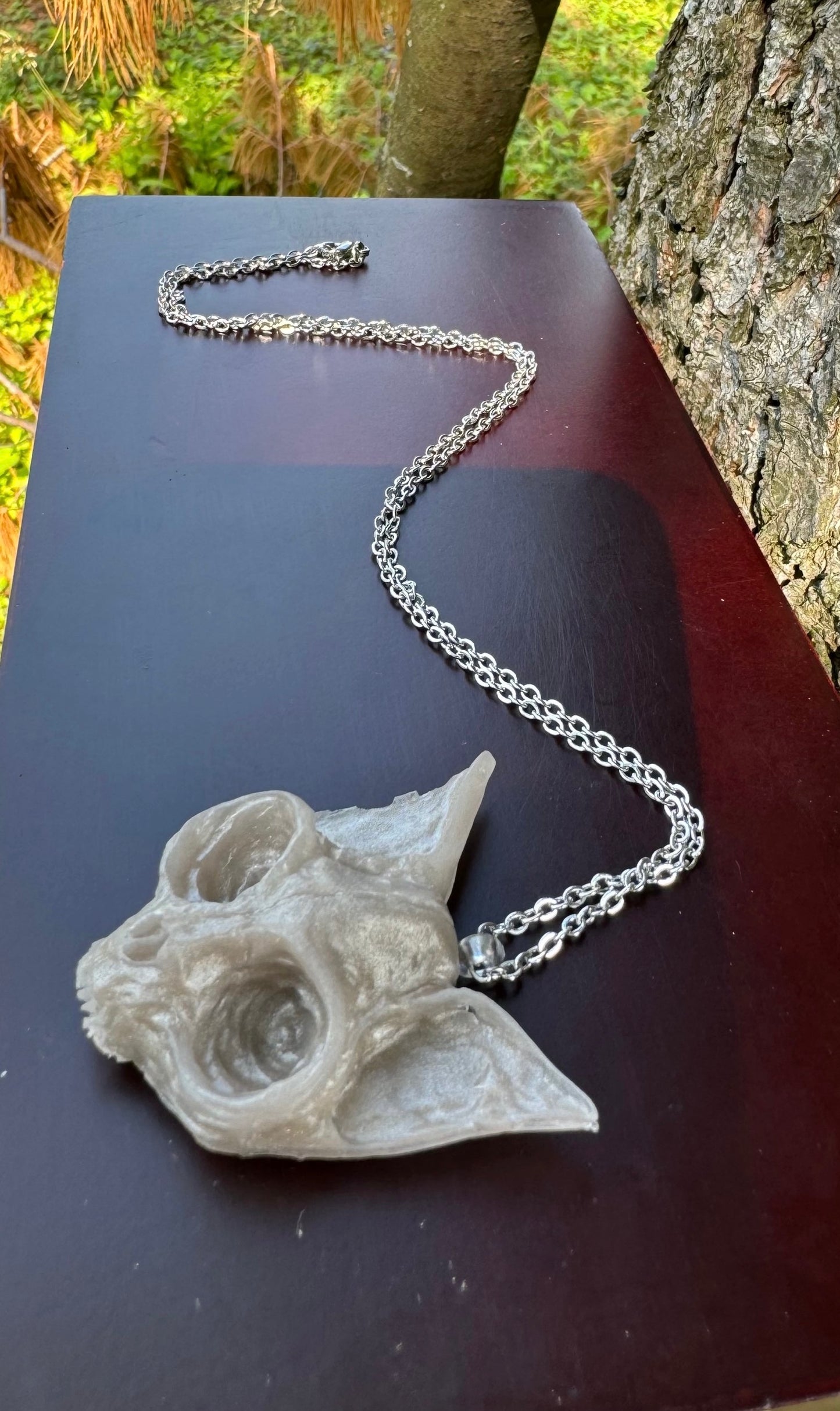 Ghostly Whiskers: Resin Skeleton Cat Necklace image 1