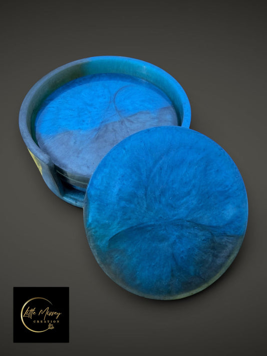 Little Missey Creation handcrafted blue resin coaster set with matching round storage holder and swirling patterns.