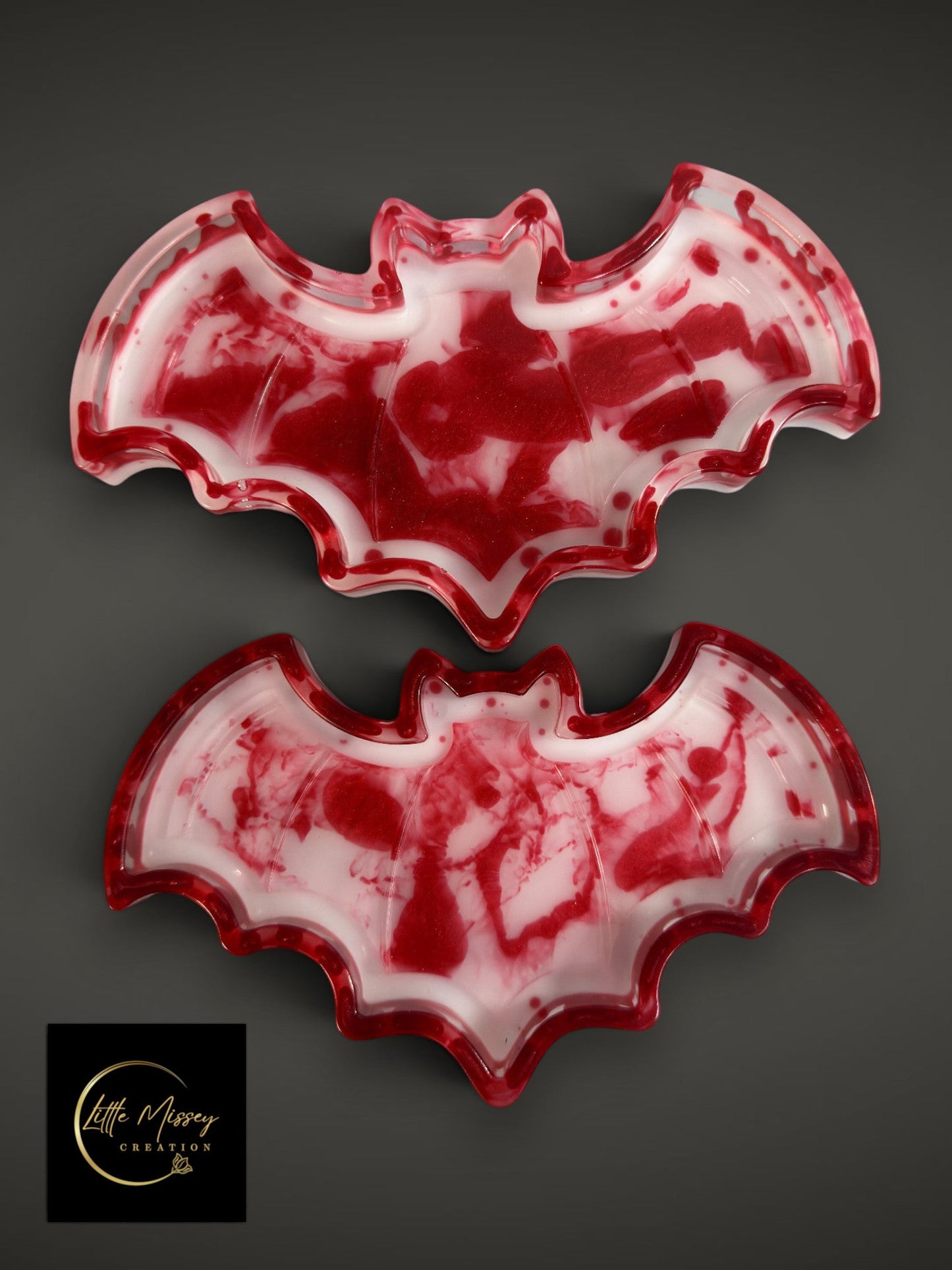 Little Missey Creation bat-shaped resin trays with a red and white marbled blood-splatter effect for gothic decor.