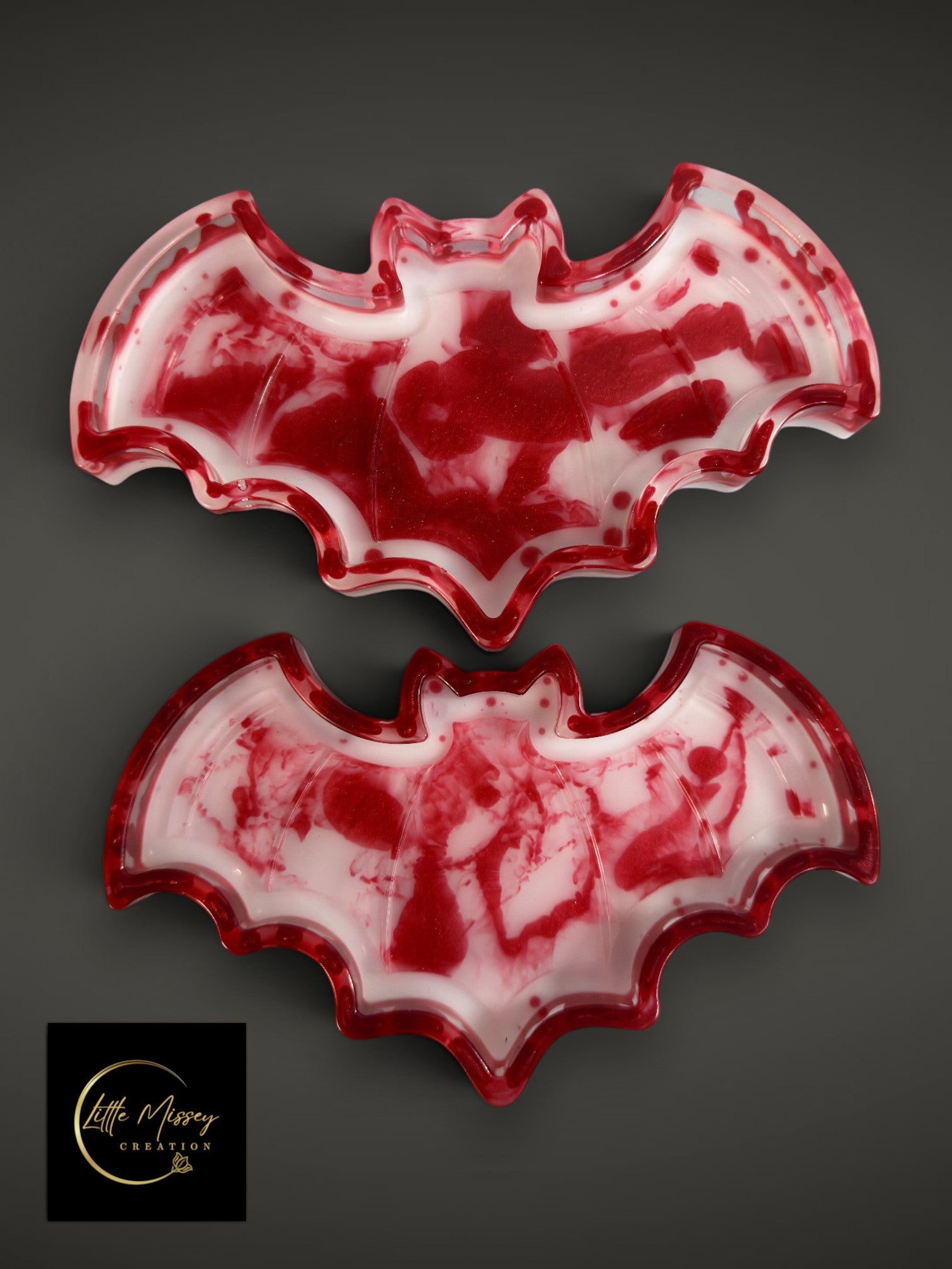 Little Missey Creation bat-shaped resin trays with a red and white marbled blood-splatter effect for gothic decor.