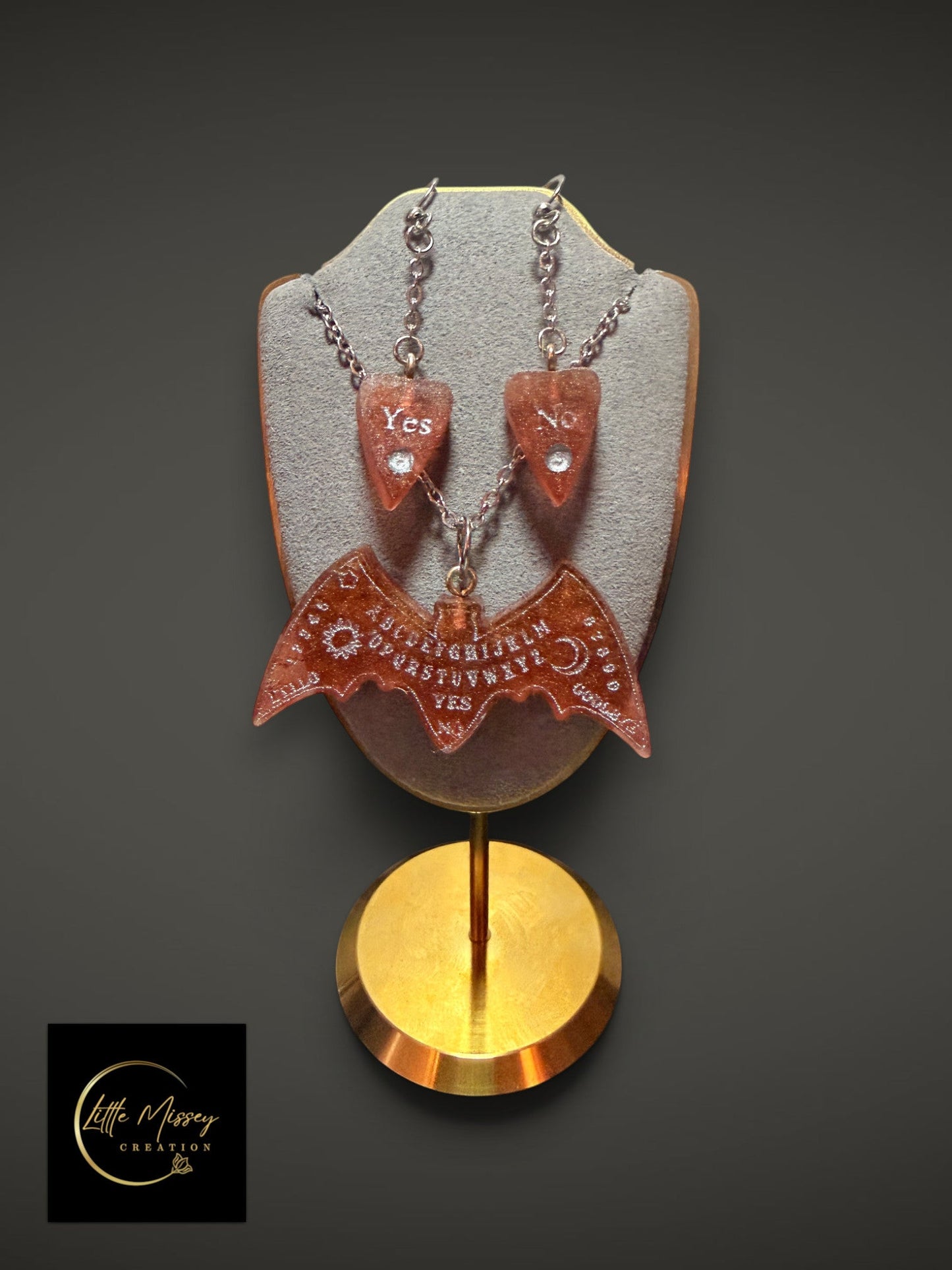 Little Missey Creation gothic spirit board bat necklace and planchette earrings set in shimmering copper resin.