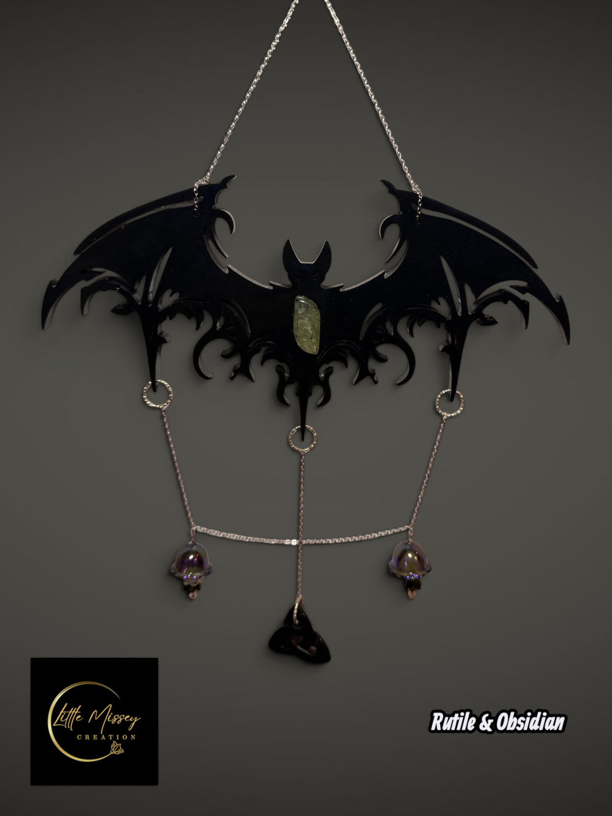 Little Missey Creation handcrafted black resin bat wall hanging with rutile, obsidian, and delicate silver chains.