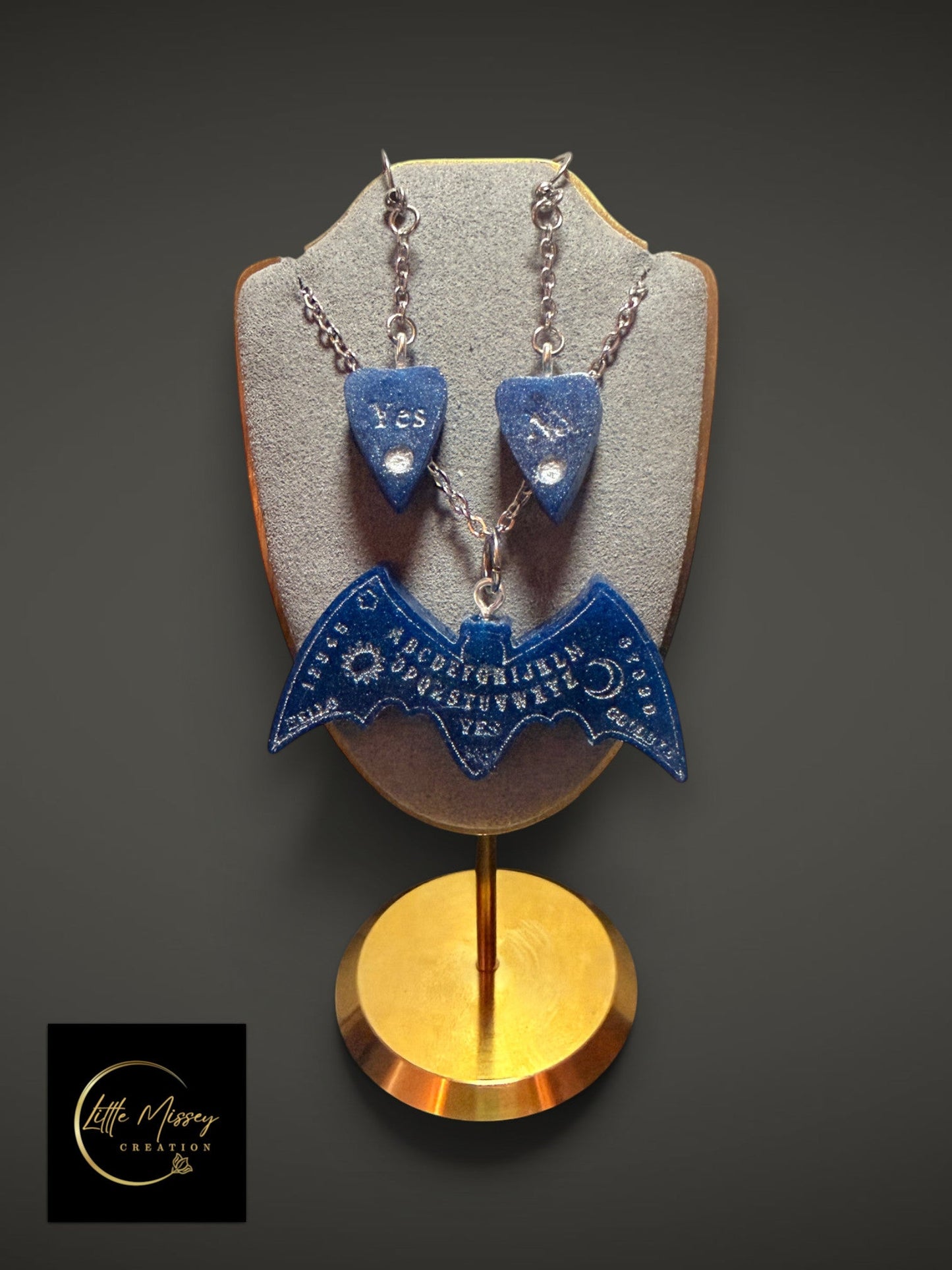 Little Missey Creation blue resin bat spirit board necklace and planchette earrings set with silver detailing