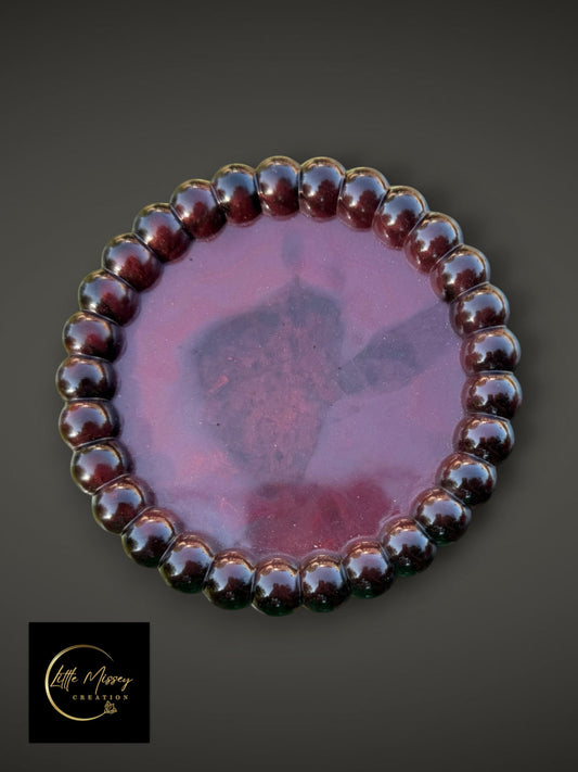 Little Missey Creation round resin tray in deep burgundy with a glossy finish and a decorative beaded edge.