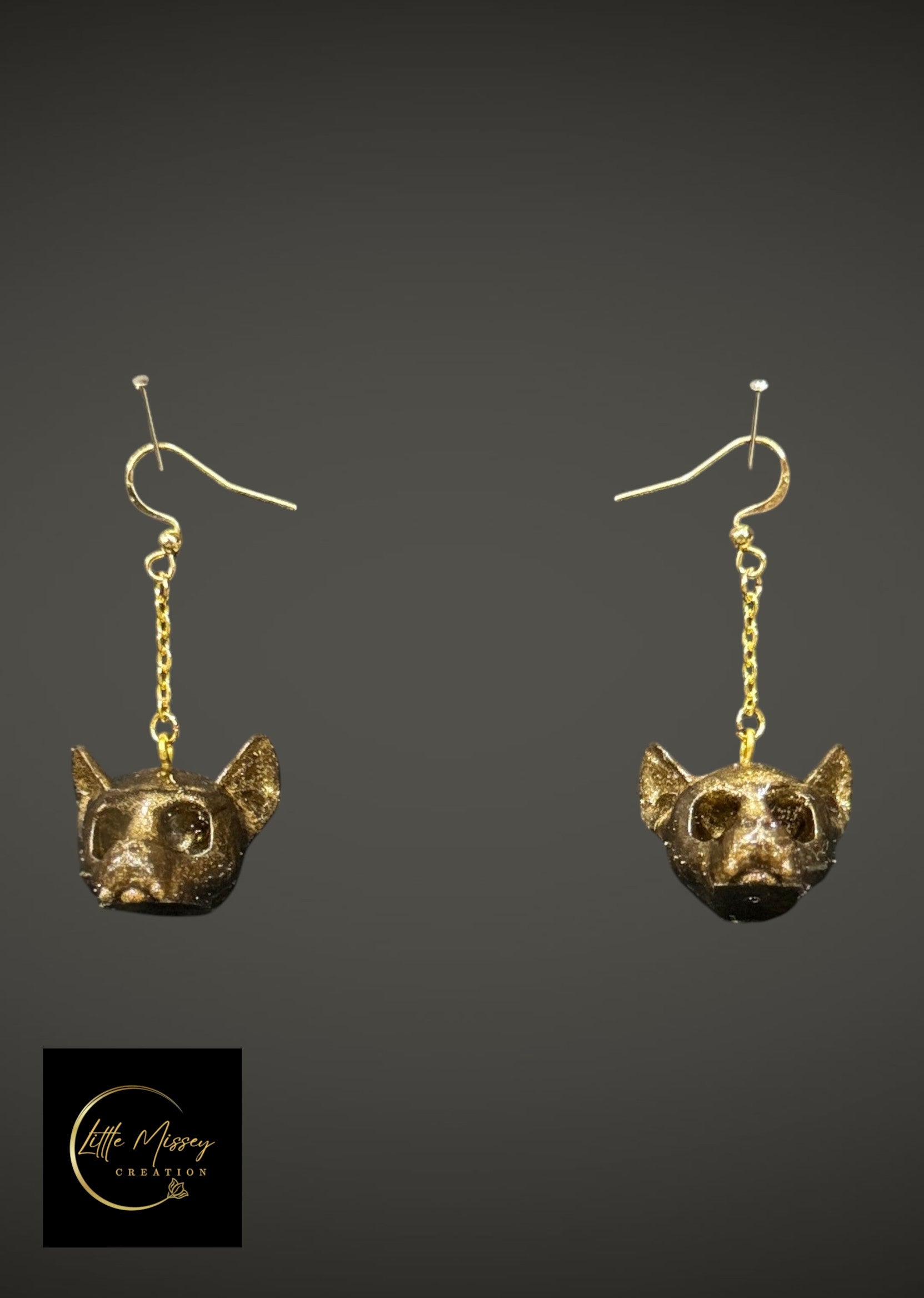 Little Missey Creation gold glitter epoxy resin bat skull drop earrings on gold-tone chains