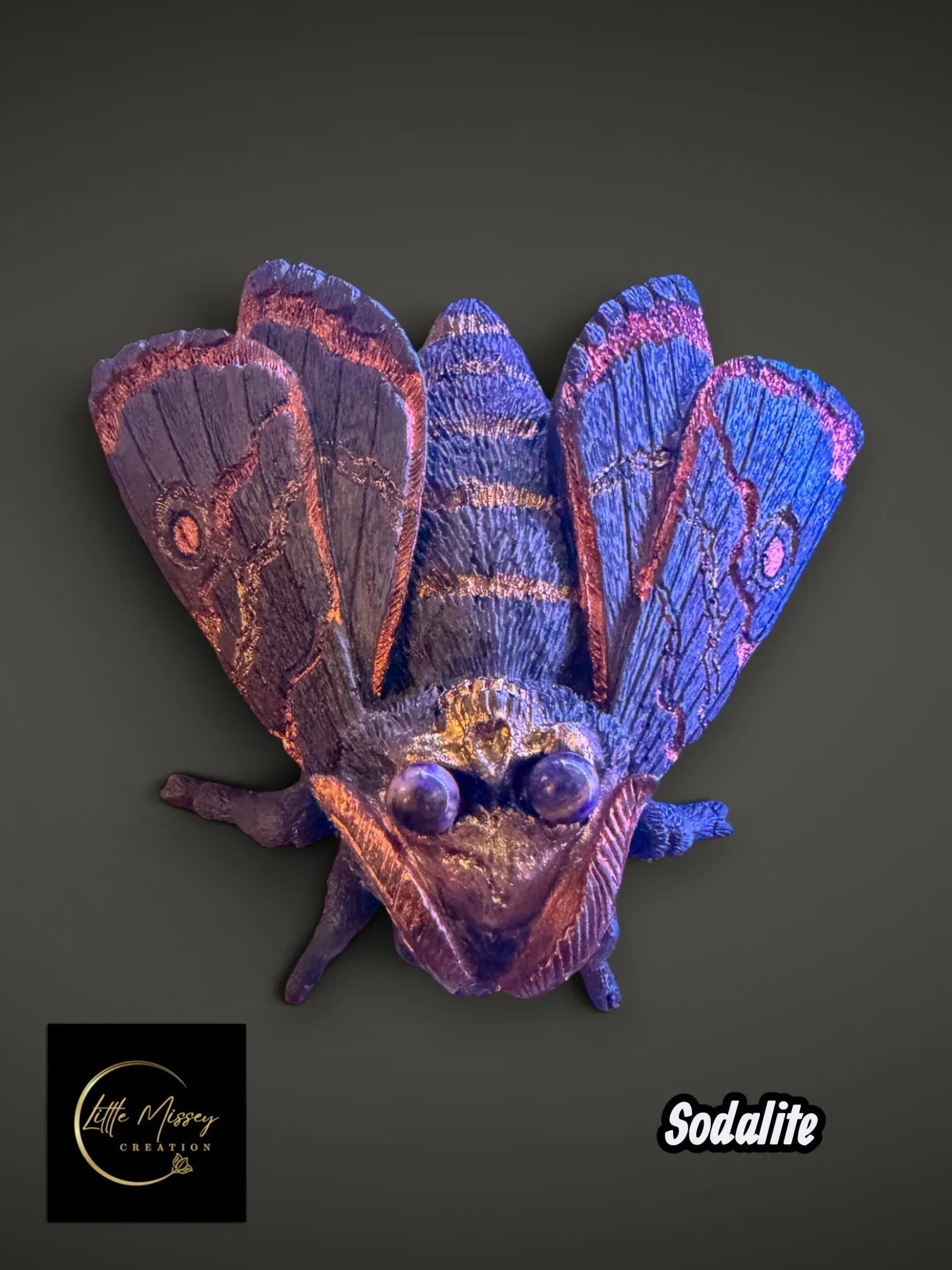 Little Missey Creation handpainted moth figurine in deep blue and purple with shimmering metallic copper accents