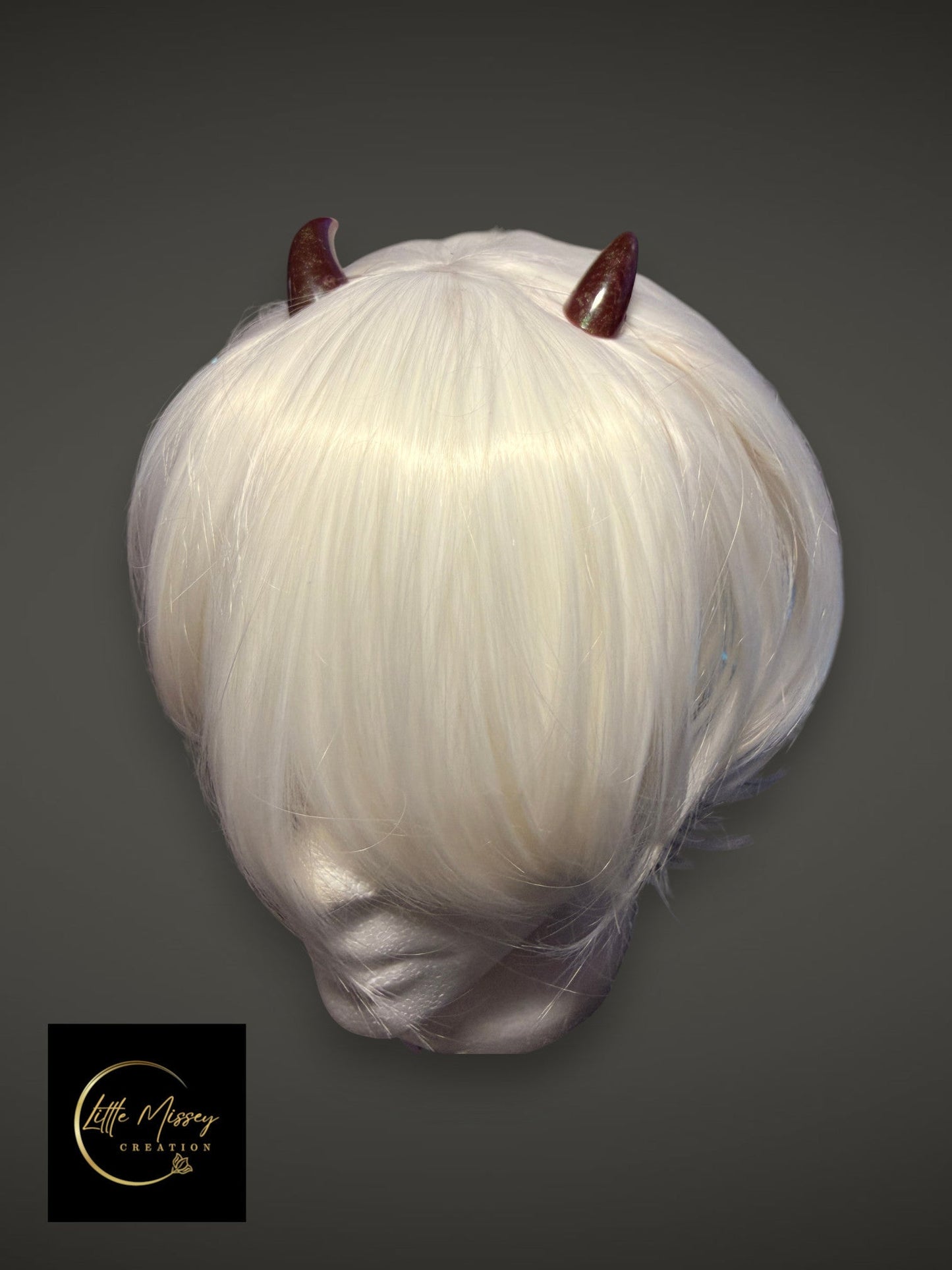 Little Missey Creation handcrafted dark red glossy demon horns on a white bob wig for cosplay and anime costumes