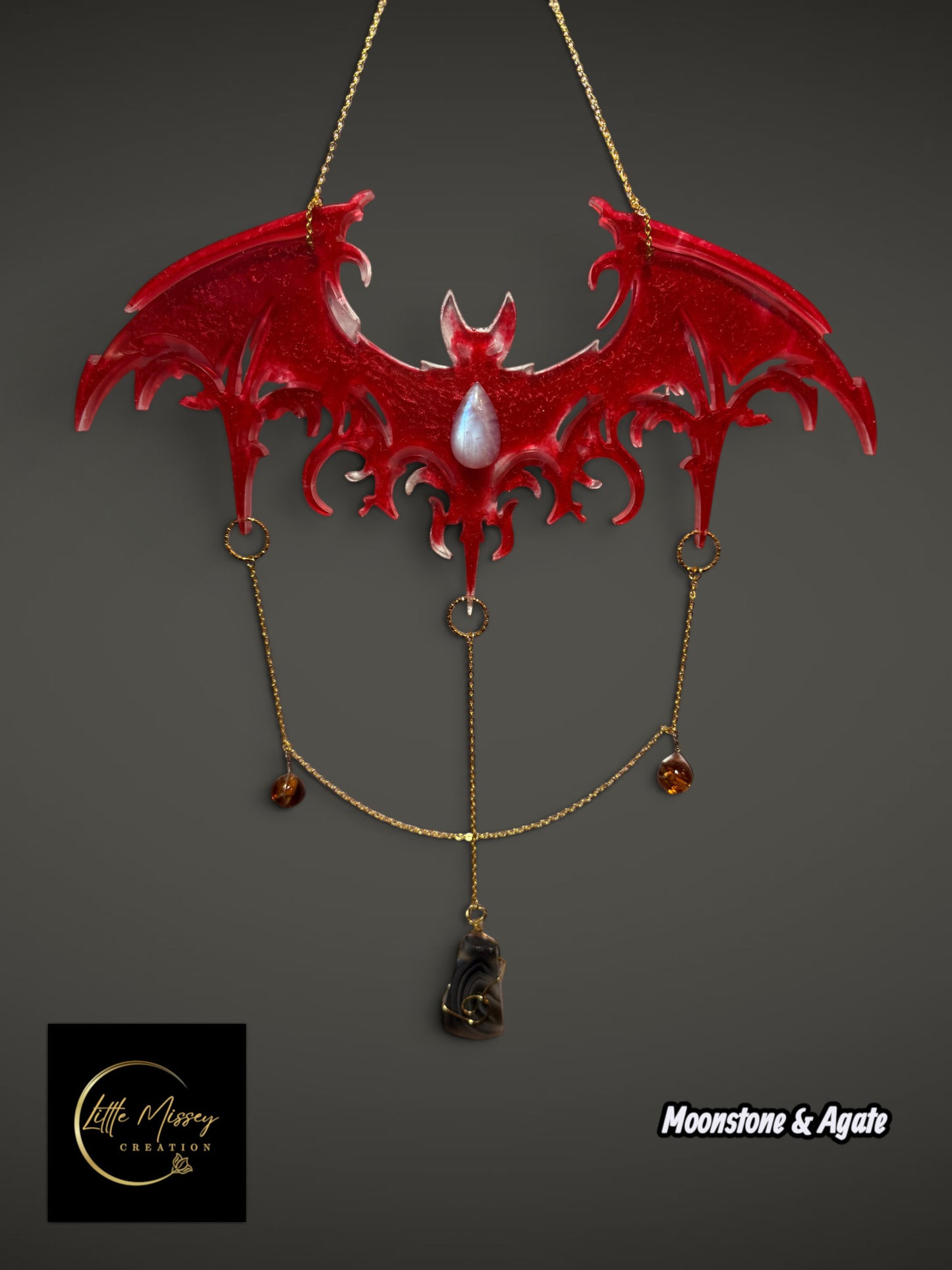 Little Missey Creation handcrafted red resin bat wall hanging with moonstone, agate, and gold chain accents.