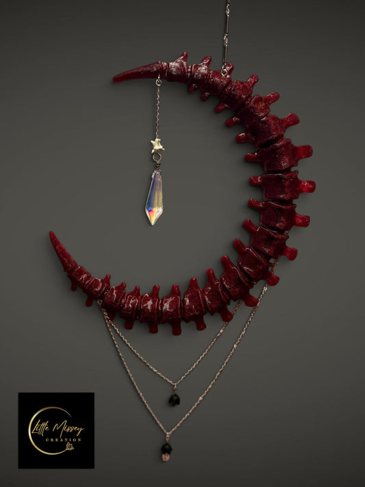 Little Missey Creation blood-red crescent spine wall hanging made of resin with silver chains and crystal accents