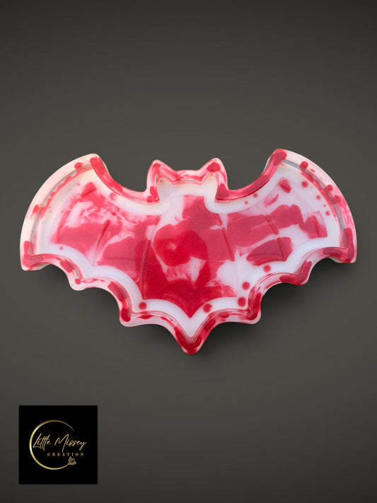 Little Missey Creation bat-shaped resin tray with a red and white marbled design for gothic home decor.